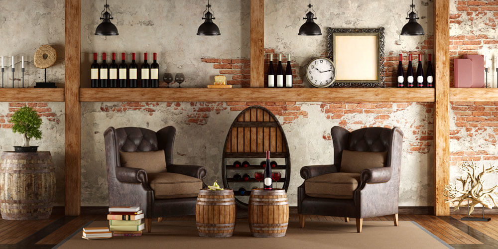 Gemütlicher Fachwerk-Weinkeller mit antiken Ohrensesseln und Tischen aus Wein-Holzfässern
